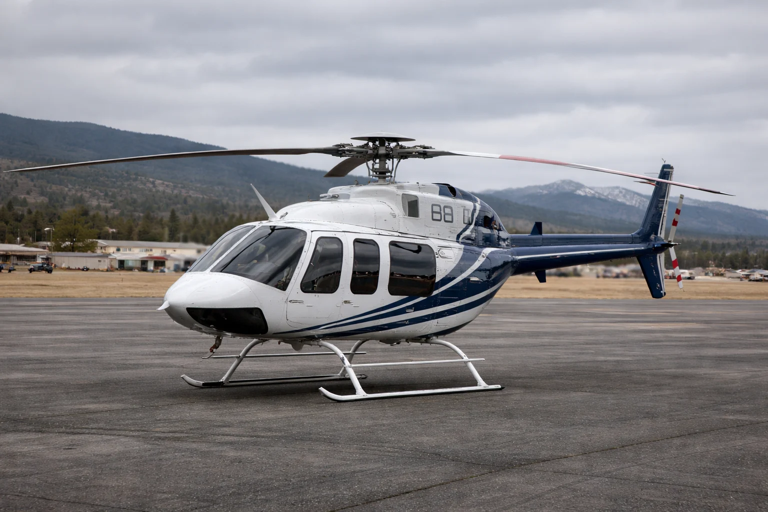 Bell 407 helicopter on an airport ramp in northern Arizona